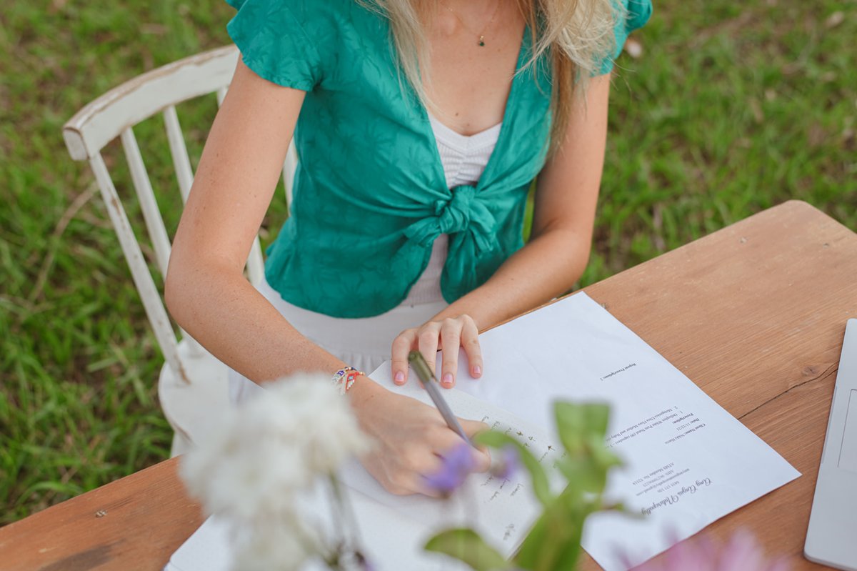 Amy Angus naturopath working at desk