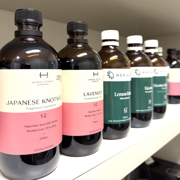 Liquid herbal extract bottles including Japanese Knotweed and Lavender